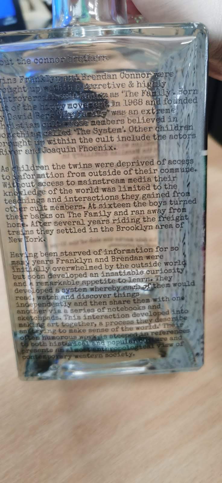 Reverse face — long-form Connor Brothers biography printed straight to the bottle.