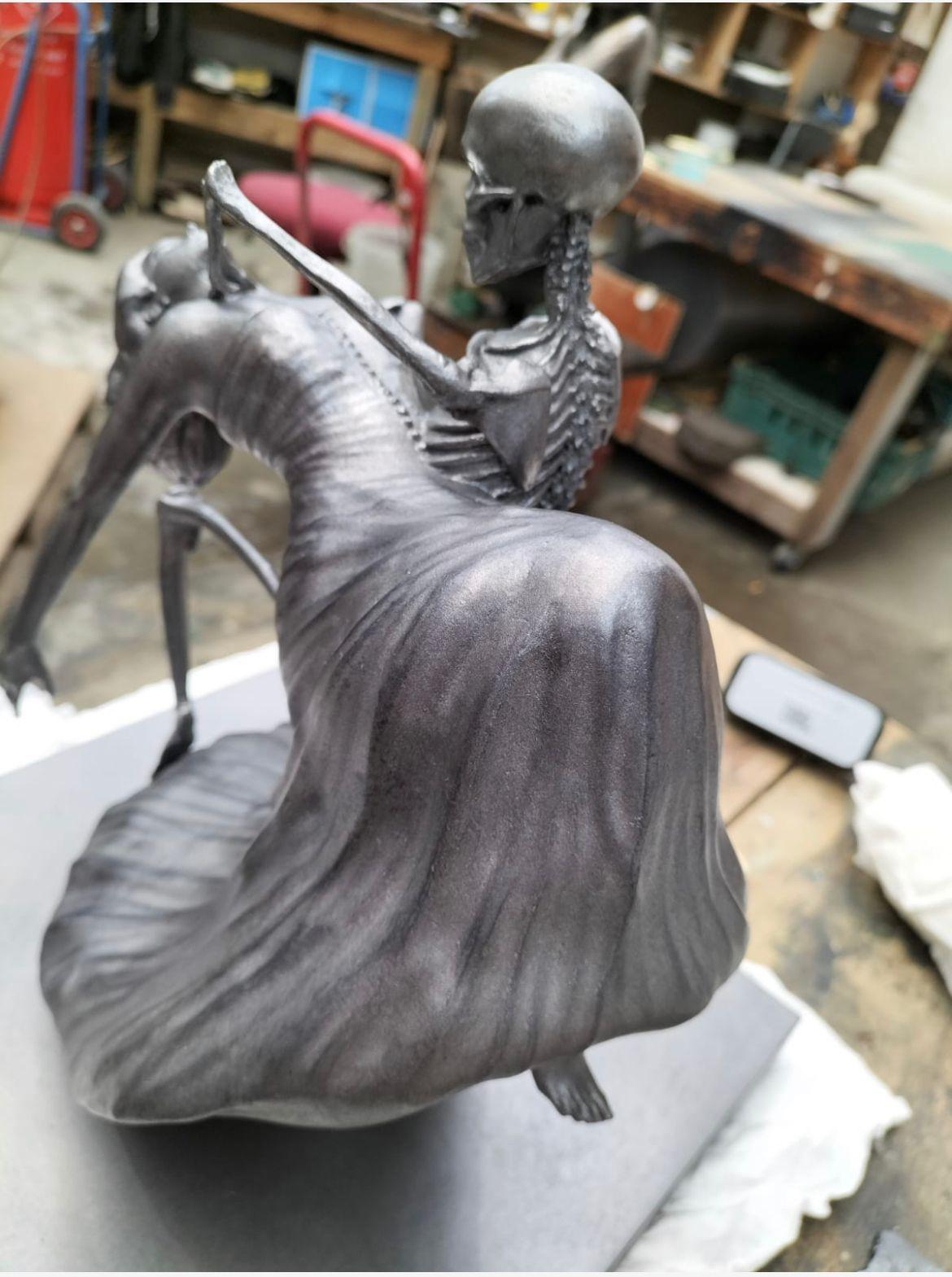 Bronze, back — one of ten in the edition.