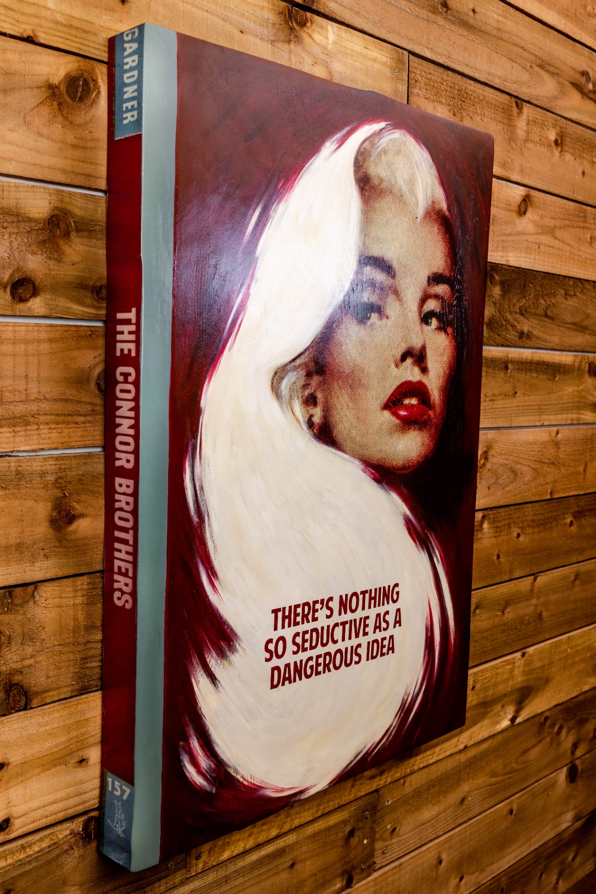 Finished jumbo book — wall-hung, gallery-ready for Maddox.