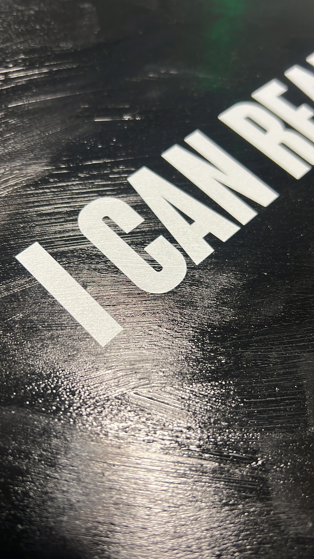 Cover detail — oil on textured ground.