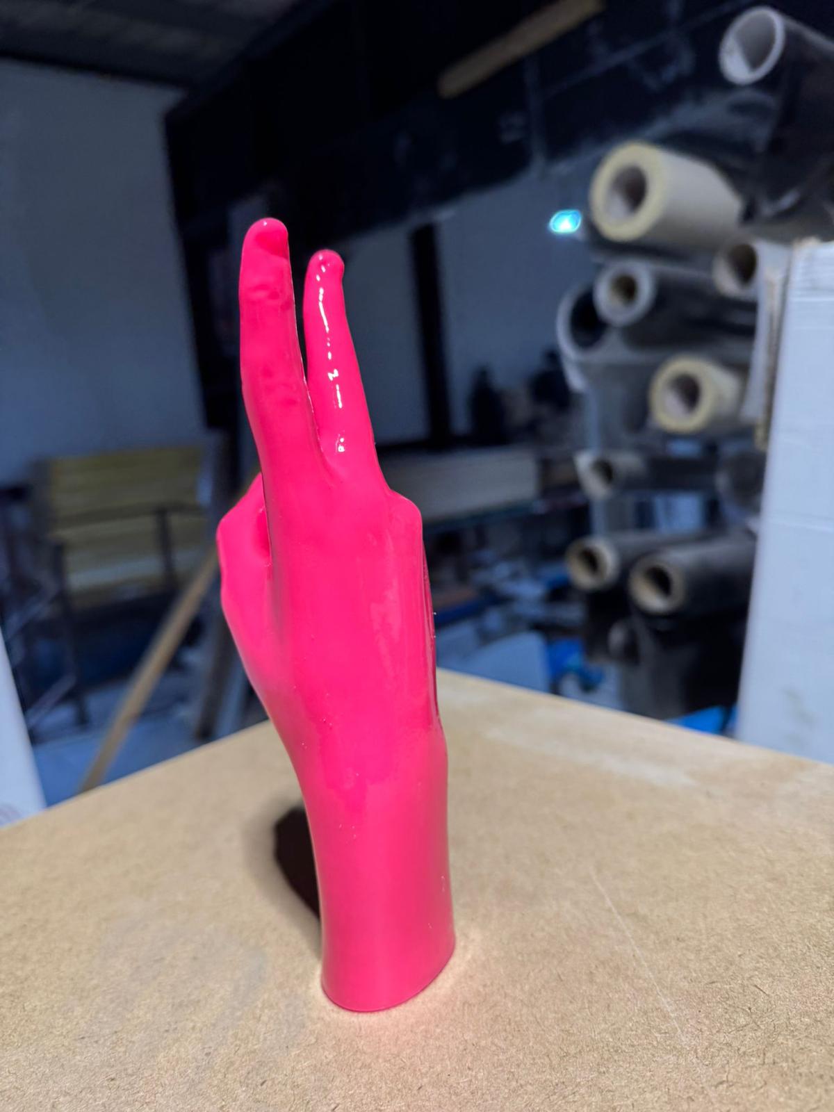 Profile — clean line from wrist to fingertip, high-gloss finish across the whole piece.