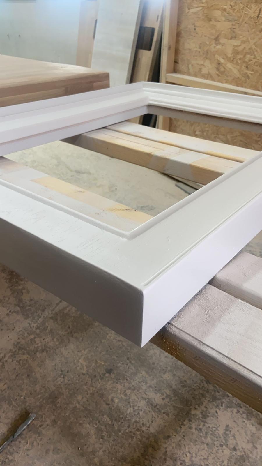 Machined in solid white oak, primed white in Aberdeen.