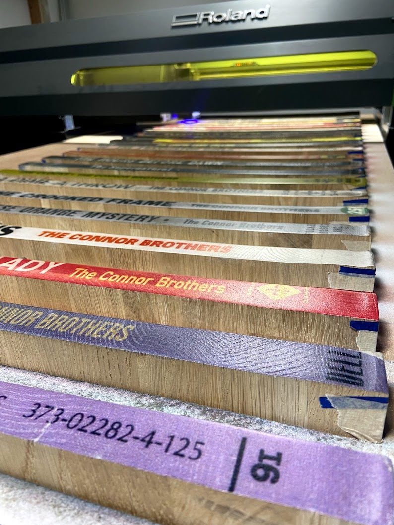 On the modified Roland — bindings printed at 750mm tall, well beyond factory spec.